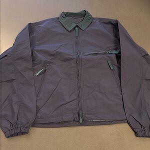New Navy Windbreaker with Green lining and accents.